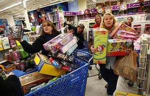 Eager Retailers Greet Crowds Of Shoppers On "Black Friday"